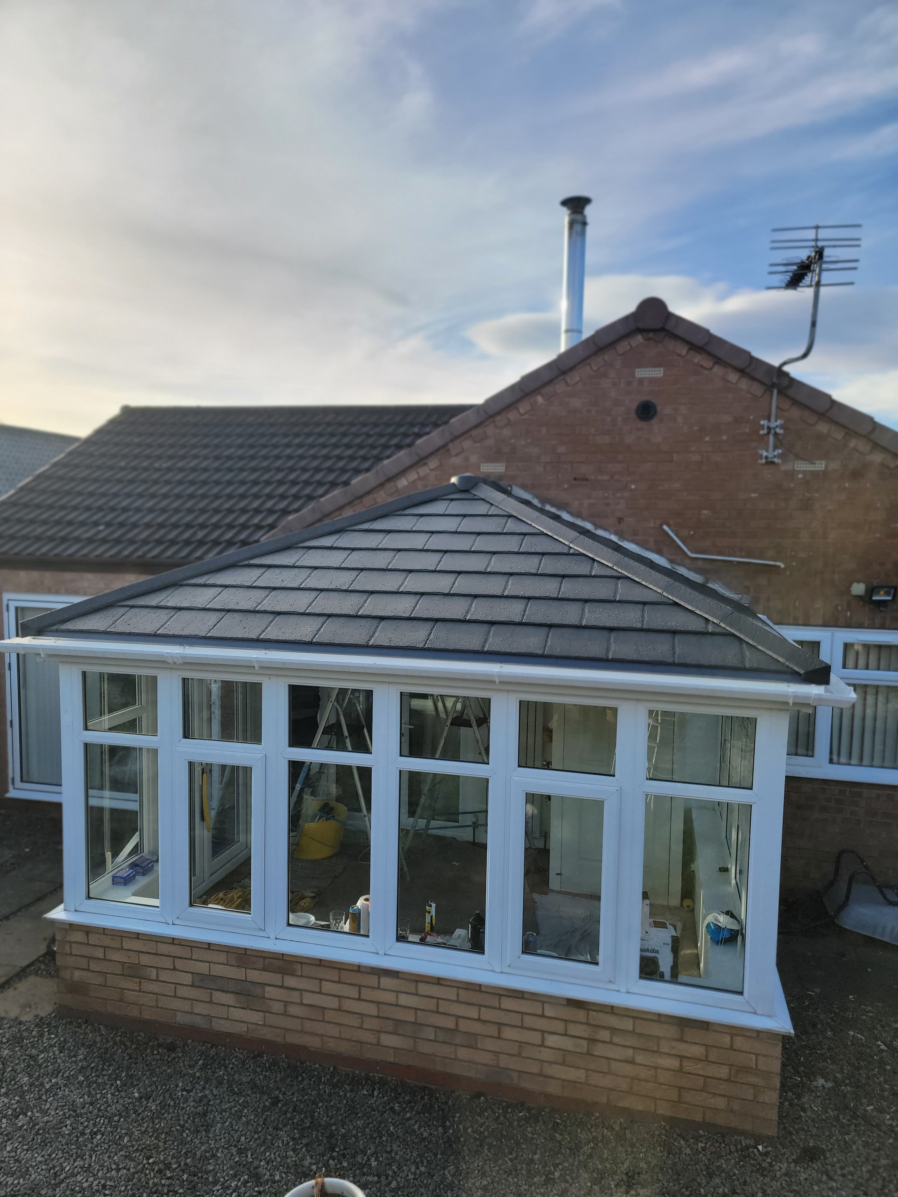 Eco Friendly tiled conservatory roof installation